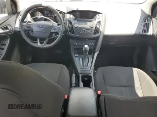 2016 Ford Focus SE with VIN 1FADP3F29GL233719, listed as a Copart auction lot 56857705 with 140,785 mi miles and Salvage title. Bid and sale history available at DreamBid. Image 8.