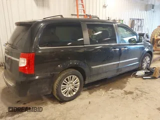 2015 Chrysler Town & Country Touring-L with VIN 2C4RC1CG3FR726639, listed as a IAAI auction lot 41502793 with 161,440 mi miles. Bid and sale history available at carsss.com. Image 4.