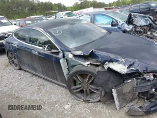 2014 Tesla Model S 60 with VIN 5YJSA1H15EFP43884, listed as a IAAI auction lot 41993180 with 78,305 mi miles and . Bid and sale history available at DreamBid. Image 12.