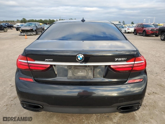 2017 BMW 7 Series 750i with VIN WBA7F0C50HGM21060, listed as a Copart auction lot 88410465 with 82,110 mi miles and Salvage Title. Bid and sale history available at carsss.com. Image 6.