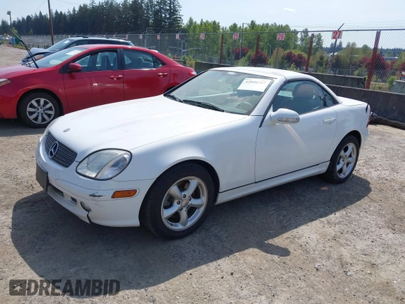 2001 Mercedes-Benz SLK-Class with VIN WDBKK65F31F172555, listed as a IAAI auction lot 42056347 with 197,272 mi miles. Bid and sale history available at carsss.com. Image 2.