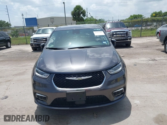2023 Chrysler Pacifica Touring L with VIN 2C4RC1BG6PR590302, listed as a IAAI auction lot 42451369 with 72,097 mi miles and . Bid and sale history available at DreamBid. Image 6.