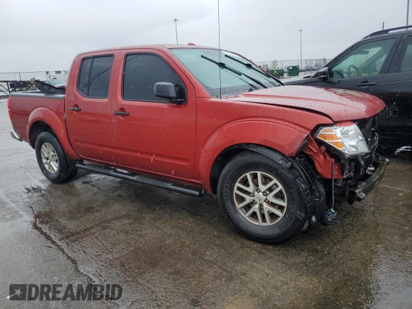 2015 Nissan Frontier SV with VIN 1N6AD0ER3FN717050, listed as a Copart auction lot 54595625 with 123,698 mi miles and Salvage title. Bid and sale history available at DreamBid. Image 4.