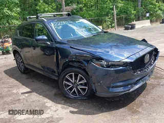 2018 Mazda CX-5 Grand Touring with VIN JM3KFBDM2J0373386, listed as a IAAI auction lot 42200795 with 70,111 mi miles and . Bid and sale history available at DreamBid. Image 1.