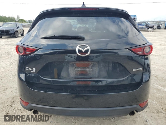 2020 Mazda CX-5 Grand Touring with VIN JM3KFBDM4L0738976, listed as a Copart auction lot 56683955 with 191,650 mi miles and Clean Title. Bid and sale history available at DreamBid. Image 6.