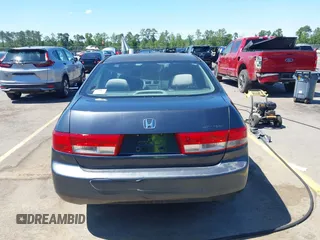 2003 Honda Accord EX z VIN 1HGCM56633A066438, wystawiony jako IAAI lot #42279849 z przebiegiem 266 239 mil mil oraz . Historia ofert i sprzedaży dostępna na DreamBid. Obrazek 16.