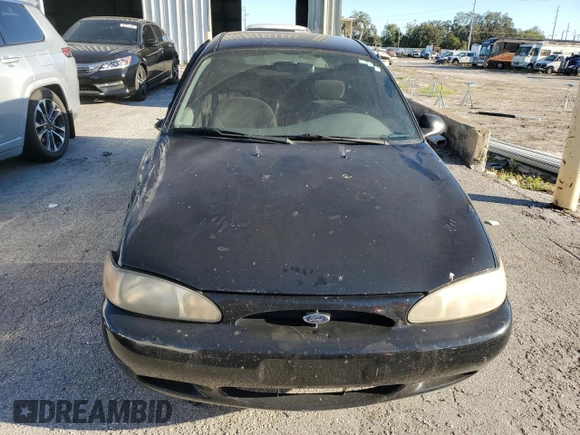 1999 Ford Escort LX с VIN 1FAFP10P5XW277376, выставлен на аукционе Copart как лот 82148204 с пробегом 127 634 миль миль и Списание • Salvage title. История ставок и продаж доступна на DreamBid. Изображение 5.
