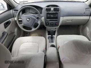2004 Kia Spectra LX with VIN KNAFE121245031019, listed as a Copart auction lot 52960135 with 183,016 mi miles and Salvage Title. Bid and sale history available at carsss.com. Image 8.