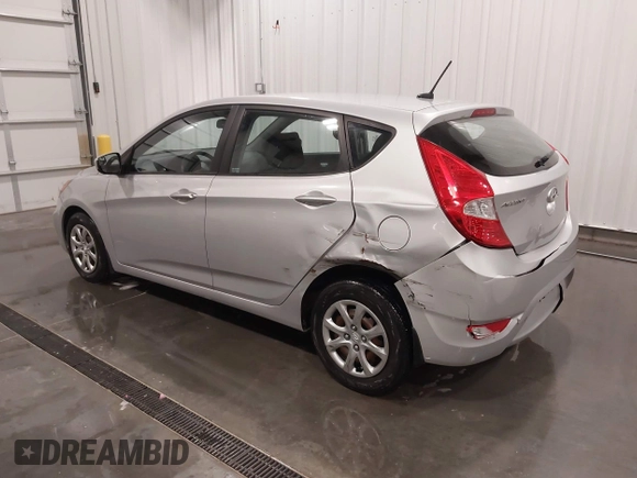 2014 Hyundai Accent GS with VIN KMHCT5AE4EU150877, listed as a IAAI auction lot 41989235 with 68,918 mi miles. Bid and sale history available at carsss.com. Image 3.