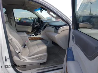 2015 GMC Yukon Denali with VIN 1GKS1CKJ5FR285199, listed as a IAAI auction lot 41763187 with 135,265 mi miles. Bid and sale history available at carsss.com. Image 5.