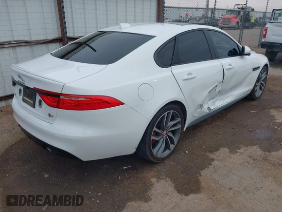2016 Jaguar XF S with VIN SAJBG4BV6GCY06777, listed as a IAAI auction lot 41439170 with 63,313 mi miles. Bid and sale history available at carsss.com. Image 4.