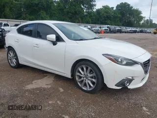 2014 Mazda 3 S Touring with VIN JM1BM1V31E1208377, listed as a IAAI auction lot 42388524 with 122,124 mi miles and . Bid and sale history available at DreamBid. Image 1.