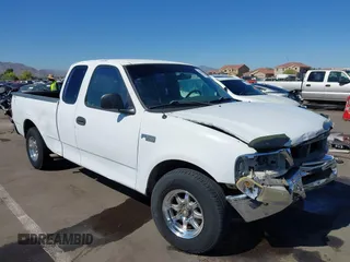 1997 Ford F-150 z VIN 1FTDX1729VKA80212, wystawiony jako IAAI lot #42218469 z przebiegiem 248 225 mil mil oraz . Historia ofert i sprzedaży dostępna na DreamBid. Obrazek 1.