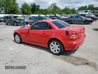 2003 Mercedes-Benz SLK 230 Kompressor with VIN WDBKK49F93F278588, listed as a Copart auction lot 58633785 with 82,409 mi miles and Salvage title. Bid and sale history available at DreamBid. Image 2.