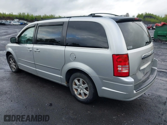 2010 Chrysler Town & Country Touring with VIN 2A4RR5D18AR151604, listed as a IAAI auction lot 42208309 with 207,886 mi miles and . Bid and sale history available at DreamBid. Image 3.