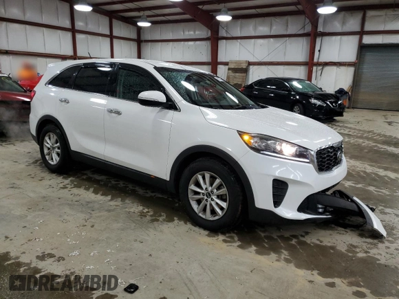 2019 Kia Sorento LX z VIN 5XYPG4A56KG558427, wystawiony jako Copart lot #51971055 z przebiegiem 103 523 mil mil oraz Szkoda całkowita • Salvage title. Historia ofert i sprzedaży dostępna na DreamBid. Obrazek 4.
