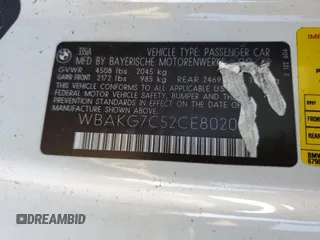 2012 BMW 3 Series 335i with VIN WBAKG7C52CE802073, listed as a Copart auction lot 41784224 with 0 mi miles and Salvage Title. Bid and sale history available at carsss.com. Image 14.