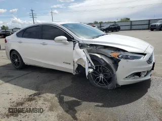 2017 Ford Fusion Hybrid SE with VIN 3FA6P0LU8HR142229, listed as a Copart auction lot 57079925 with 118,629 mi miles and Salvage title. Bid and sale history available at DreamBid. Image 4.