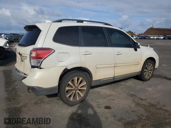 2017 Subaru Forester Touring with VIN JF2SJGWC2HH567597, listed as a Copart auction lot 45062975 with 74,277 mi miles and Salvage Title. Bid and sale history available at carsss.com. Image 3.