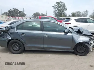 2012 Volkswagen Jetta SE z VIN 3VWDP7AJ0CM025153, wystawiony jako IAAI lot #42420514 z przebiegiem 116 660 mil mil oraz . Historia ofert i sprzedaży dostępna na DreamBid. Obrazek 13.