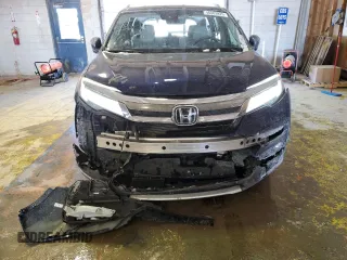 2020 Honda Pilot Touring 7-Passenger z VIN 5FNYF6H67LB031880, wystawiony jako Copart lot #46083925 z przebiegiem 59 729 mil mil oraz Szkoda całkowita • Salvage title. Historia ofert i sprzedaży dostępna na DreamBid. Obrazek 5.
