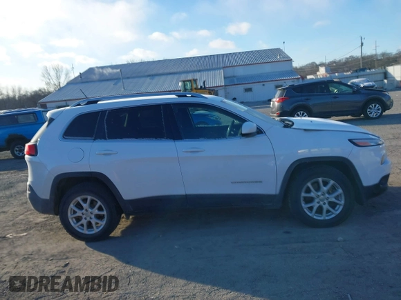 2018 Jeep Cherokee Latitude with VIN 1C4PJMCX8JD548480, listed as a IAAI auction lot 41378186 with 52,051 mi miles and . Bid and sale history available at DreamBid. Image 13.