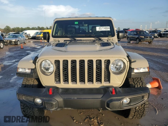 2022 Jeep Gladiator Rubicon z VIN 1C6JJTBG3NL174980, wystawiony jako Copart lot #85774884 z przebiegiem Nie podano mil oraz Nie do naprawy • Non repairable. Historia ofert i sprzedaży dostępna na DreamBid. Obrazek 5.