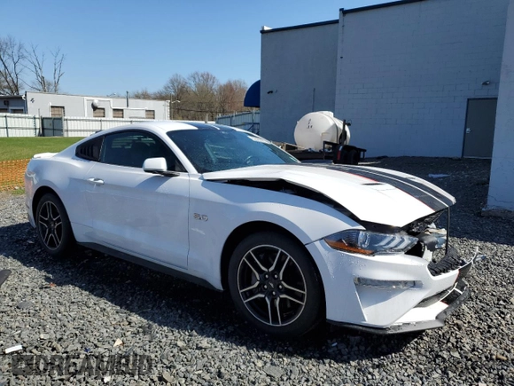 2021 Ford Mustang GT z VIN 1FA6P8CF5M5118306, wystawiony jako Copart lot #52409455 z przebiegiem 16 033 mil mil oraz Szkody całkowita. Historia ofert i sprzedaży dostępna na DreamBid. Obrazek 4.