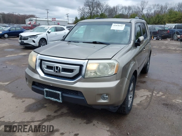 2009 Honda Pilot EX-L with VIN 5FNYF48569B002035, listed as a IAAI auction lot 41838347 with 198,849 mi miles. Bid and sale history available at carsss.com. Image 2.