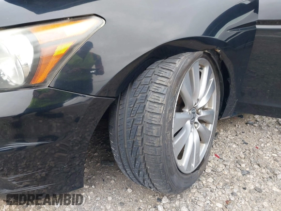 2012 Honda Accord EX with VIN 1HGCP2E77CA028100, listed as a IAAI auction lot 42648699 with 167,661 mi miles and . Bid and sale history available at DreamBid. Image 6.
