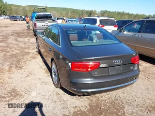 2011 Audi A8 with VIN WAURVAFDXBN014290, listed as a IAAI auction lot 40860777 with 152,584 mi miles and . Bid and sale history available at DreamBid. Image 3.
