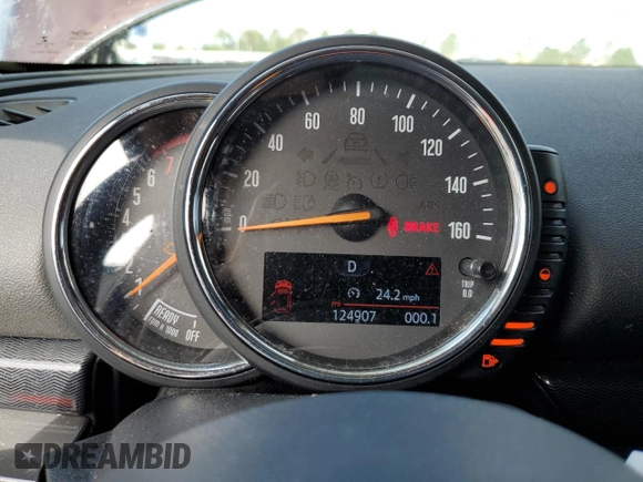 2017 MINI Clubman Cooper with VIN WMWLN5C51H2E32907, listed as a Copart auction lot 51226515 with 124,907 mi miles and Salvage Title. Bid and sale history available at DreamBid. Image 9.