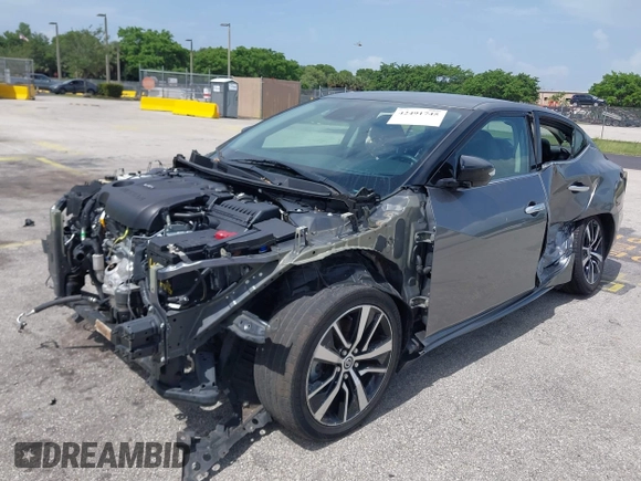 2021 Nissan Maxima SV z VIN 1N4AA6CVXMC508952, wystawiony jako IAAI lot #42491745 z przebiegiem 66 250 mil mil oraz . Historia ofert i sprzedaży dostępna na DreamBid. Obrazek 2.