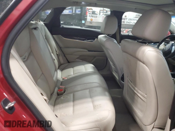 2015 Cadillac XTS Luxury z VIN 2G61M5S39F9189133, wystawiony jako Copart lot #56889185 z przebiegiem 130 927 mil mil oraz Czysty tytuł • Clean title. Historia ofert i sprzedaży dostępna na DreamBid. Obrazek 10.