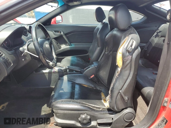 2003 Hyundai Tiburon GT z VIN KMHHN65F33U088538, wystawiony jako Copart lot #54320955 z przebiegiem 220 732 mil mil oraz Szkoda całkowita • Salvage title. Historia ofert i sprzedaży dostępna na DreamBid. Obrazek 7.