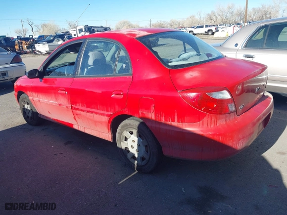 2002 Kia Rio with VIN KNADC123126182360, listed as a IAAI auction lot 41526651 with 82,052 mi miles. Bid and sale history available at carsss.com. Image 3.