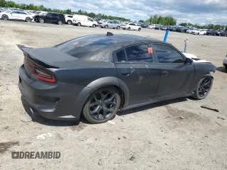 2015 Dodge Charger RT with VIN 2C3CDXCT9FH784672, listed as a Copart auction lot 58190615 with 121,033 mi miles and Salvage title. Bid and sale history available at DreamBid. Image 3.