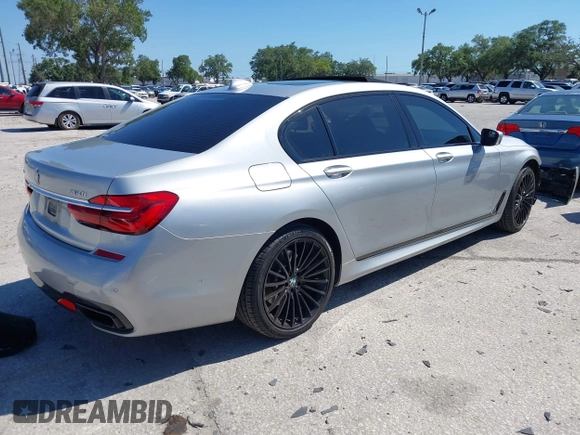 2016 BMW 7 Series 750i xDrive with VIN WBA7F2C52GG417733, listed as a IAAI auction lot 42040625 with 91,007 mi miles. Bid and sale history available at carsss.com. Image 4.
