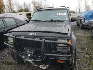 1996 Jeep Cherokee Sport with VIN 1J4FJ68S4TL240696, listed as a Copart auction lot 81193184 with 125,682 mi miles and Salvage Title. Bid and sale history available at carsss.com. Image 5.