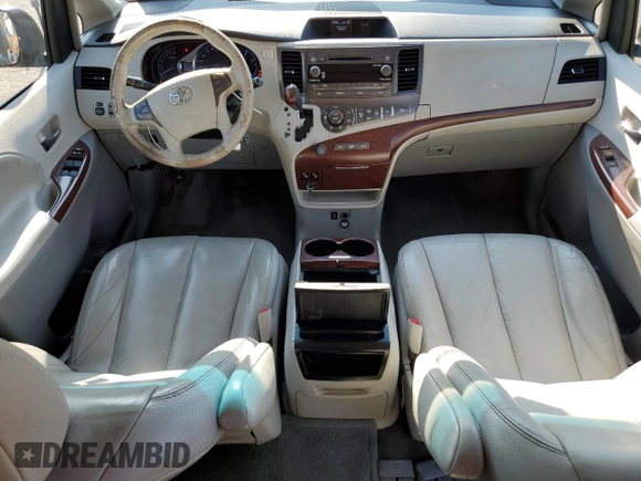 2012 Toyota Sienna XLE AAS with VIN 5TDYK3DC1CS279575, listed as a Copart auction lot 60350235 with 275,287 mi miles and Salvage title. Bid and sale history available at DreamBid. Image 8.