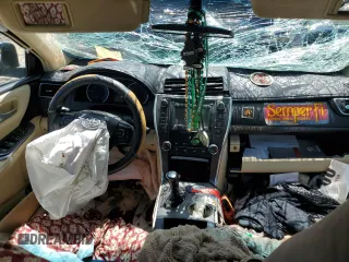 2017 Toyota Camry XLE z VIN 4T1BF1FK0HU700820, wystawiony jako Copart lot #52010655 z przebiegiem Nie podano mil oraz Szkoda całkowita • Salvage title. Historia ofert i sprzedaży dostępna na DreamBid. Obrazek 8.