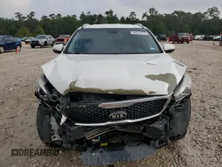 2018 Kia Sorento L z VIN 5XYPG4A35JG342050, wystawiony jako Copart lot #54517715 z przebiegiem 121 415 mil mil oraz Szkoda całkowita • Salvage title. Historia ofert i sprzedaży dostępna na DreamBid. Obrazek 5.