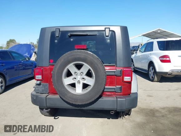 2010 Jeep Wrangler Rubicon with VIN 1J4BA6D17AL126068, listed as a IAAI auction lot 41319076 with 158,888 mi miles and . Bid and sale history available at DreamBid. Image 16.