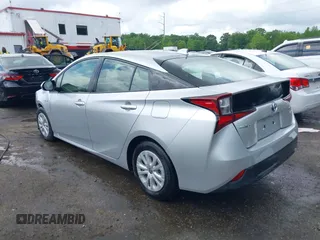 2022 Toyota Prius L Eco with VIN JTDKAMFU2N3161592, listed as a IAAI auction lot 42245464 with 146,891 mi miles and . Bid and sale history available at DreamBid. Image 3.