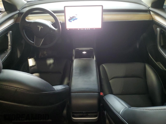 2022 Tesla Model 3 with VIN 5YJ3E1EA7NF369551, listed as a Copart auction lot 55610805 with 128,311 mi miles and Clean Title. Bid and sale history available at DreamBid. Image 8.