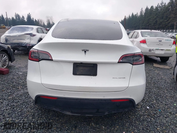 2022 Tesla Model Y Long Range z VIN 7SAYGDEE6NF451259, wystawiony jako IAAI lot #41200775 z przebiegiem 59 683 mil mil oraz . Historia ofert i sprzedaży dostępna na DreamBid. Obrazek 17.