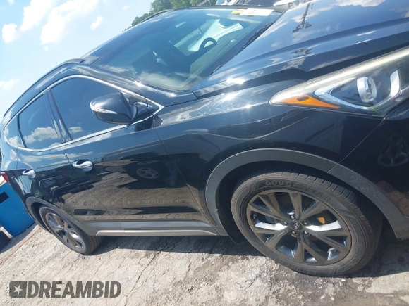 2017 Hyundai Santa Fe Ultimate with VIN 5NMZW4LA1HH052430, listed as a IAAI auction lot 42205489 with 85,720 mi miles and . Bid and sale history available at DreamBid. Image 13.