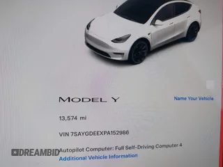 2023 Tesla Model Y Long Range with VIN 7SAYGDEEXPA152986, listed as a IAAI auction lot 41946665 with 13,574 mi miles and . Bid and sale history available at carsss.com. Image 15.