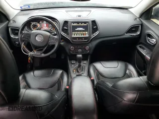 2021 Jeep Cherokee Trailhawk with VIN 1C4PJMBX5MD123854, listed as a Copart auction lot 45891165 with 98,964 mi miles and Salvage title. Bid and sale history available at DreamBid. Image 8.