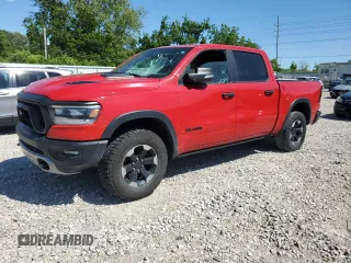 2021 Ram 1500 Rebel with VIN 1C6SRFLT5MN700510, listed as a Copart auction lot 58023725 with 103,531 mi miles and Salvage title. Bid and sale history available at DreamBid. Image 1.